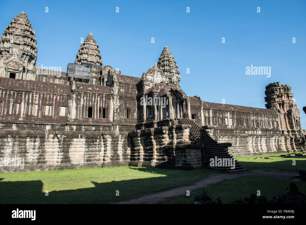 View of Angkor Wat temple and ancient sculptures. Angkor Wat is the