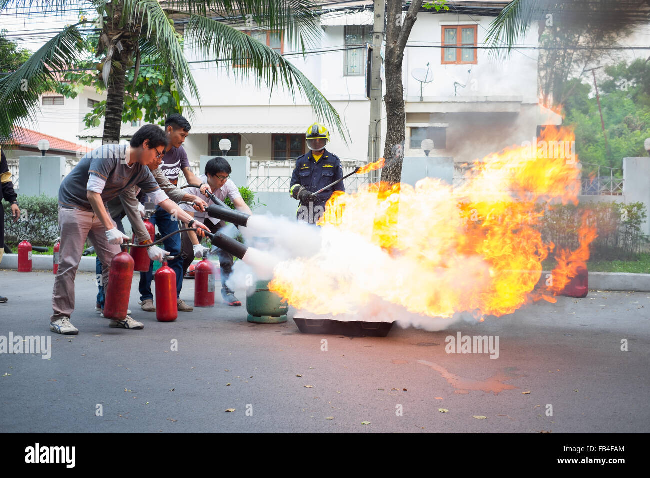 Bangkok, Thailand - November 21, 2015 : People are practicing in fire fighting training Stock Photo