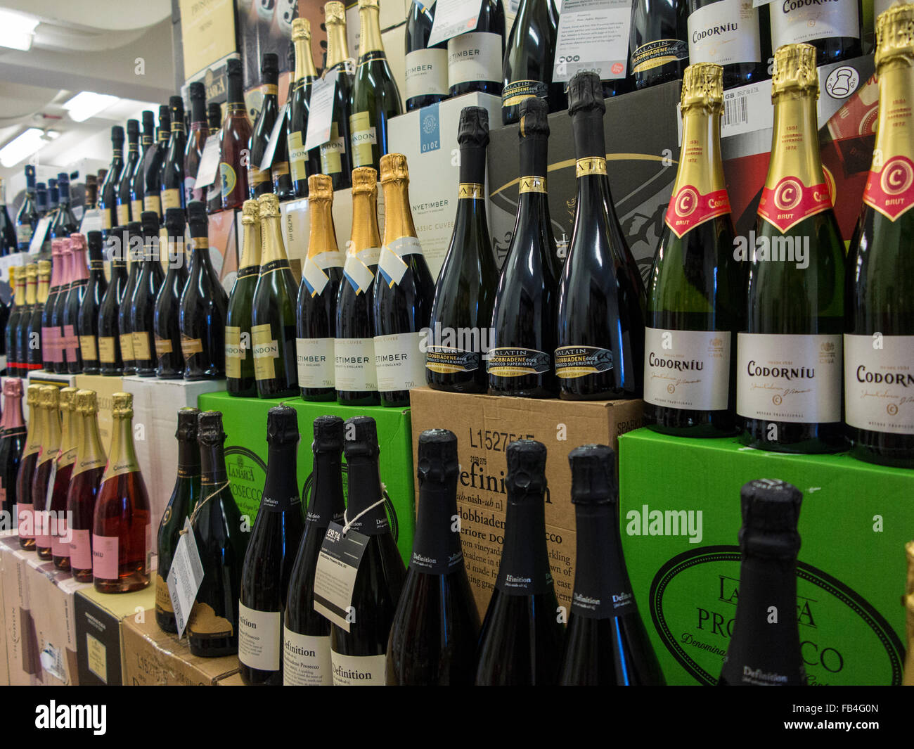Sparkling wines for sale at a wine merchant Stock Photo Alamy
