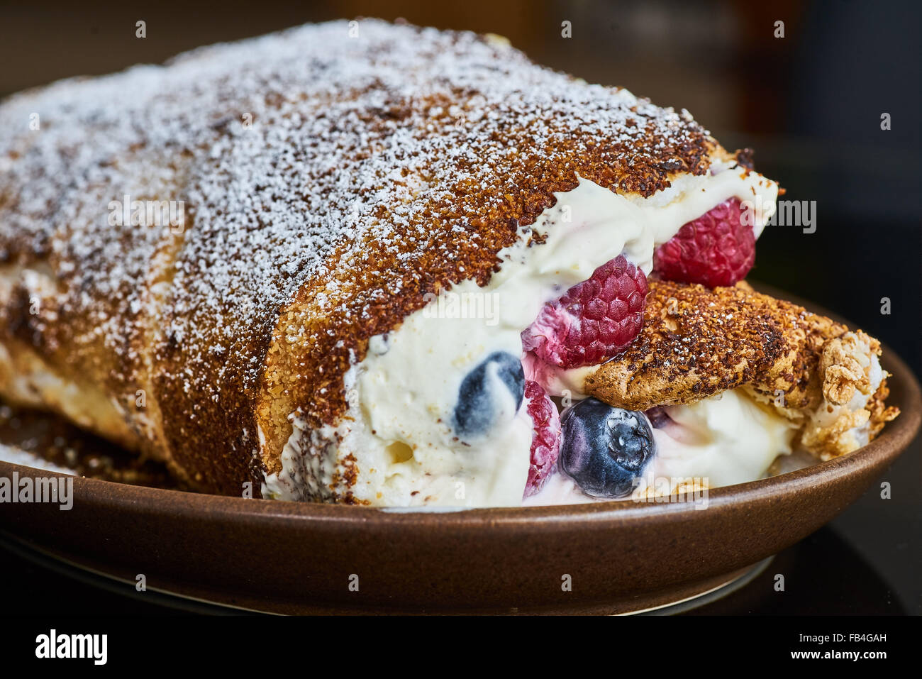 Raspberry Roulade with Cream Stock Photo Alamy
