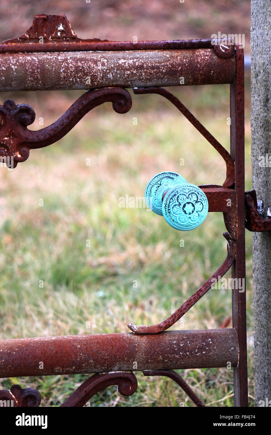 19th Century iron fence gate with an oxidized copper knowb found in a Nantucket, Massachusetts cemetery. Stock Photo