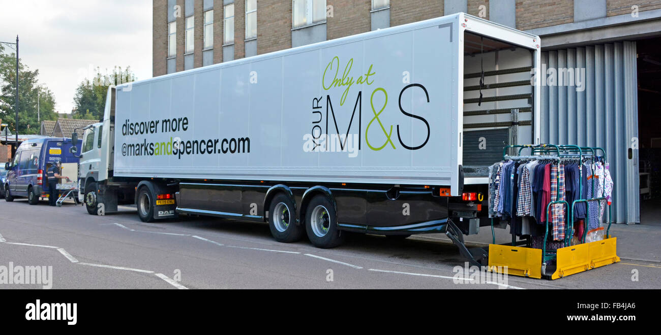 M&S lorry truck & articulated trailer making fashion clothing delivery to rear of Marks and Spencer retail store building Brentwood Essex England UK Stock Photo