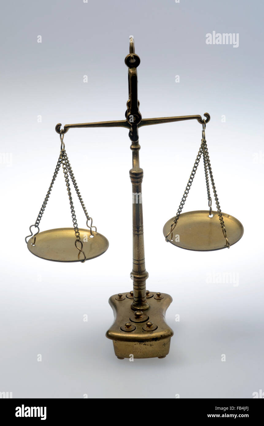 Old Golden weighing scale balance Stock Photo