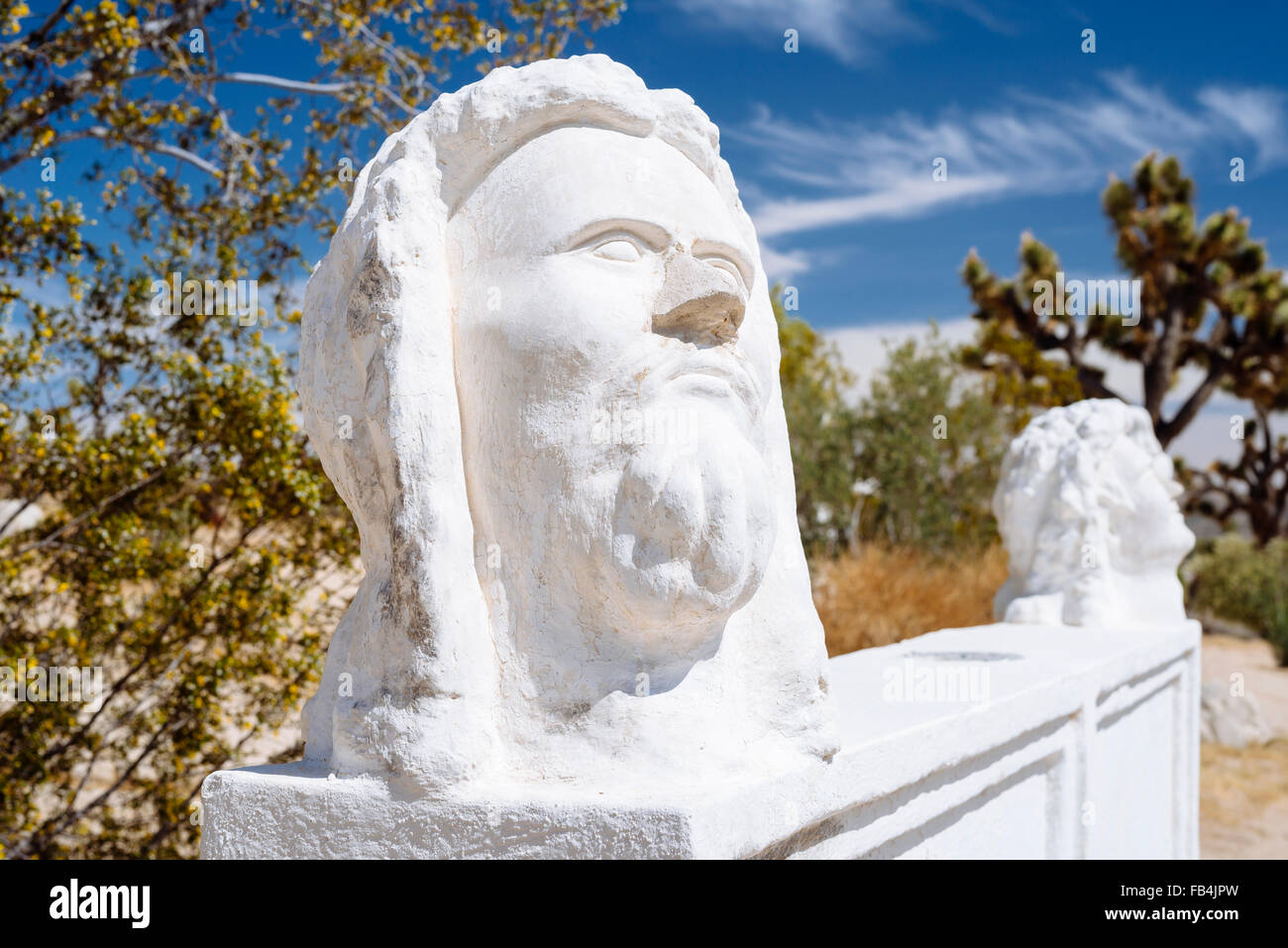 A sculpture of two human heads in Desert Christ Park, Southeastern California Stock Photo