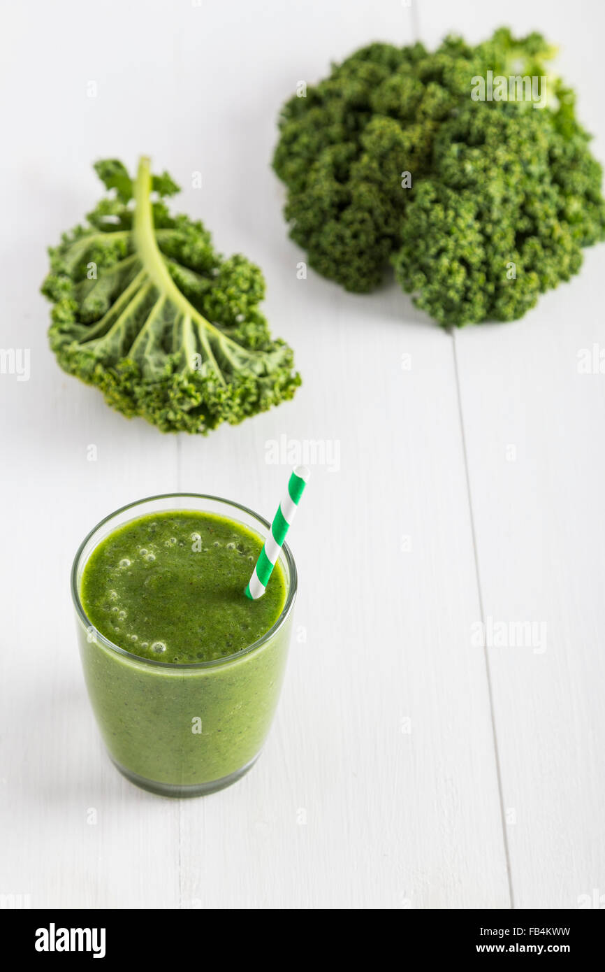 Green smoothie with kale leaves Stock Photo