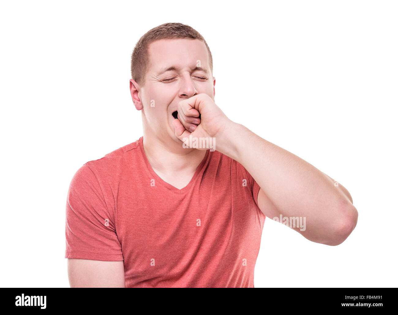 Young man yawning Stock Photo Alamy