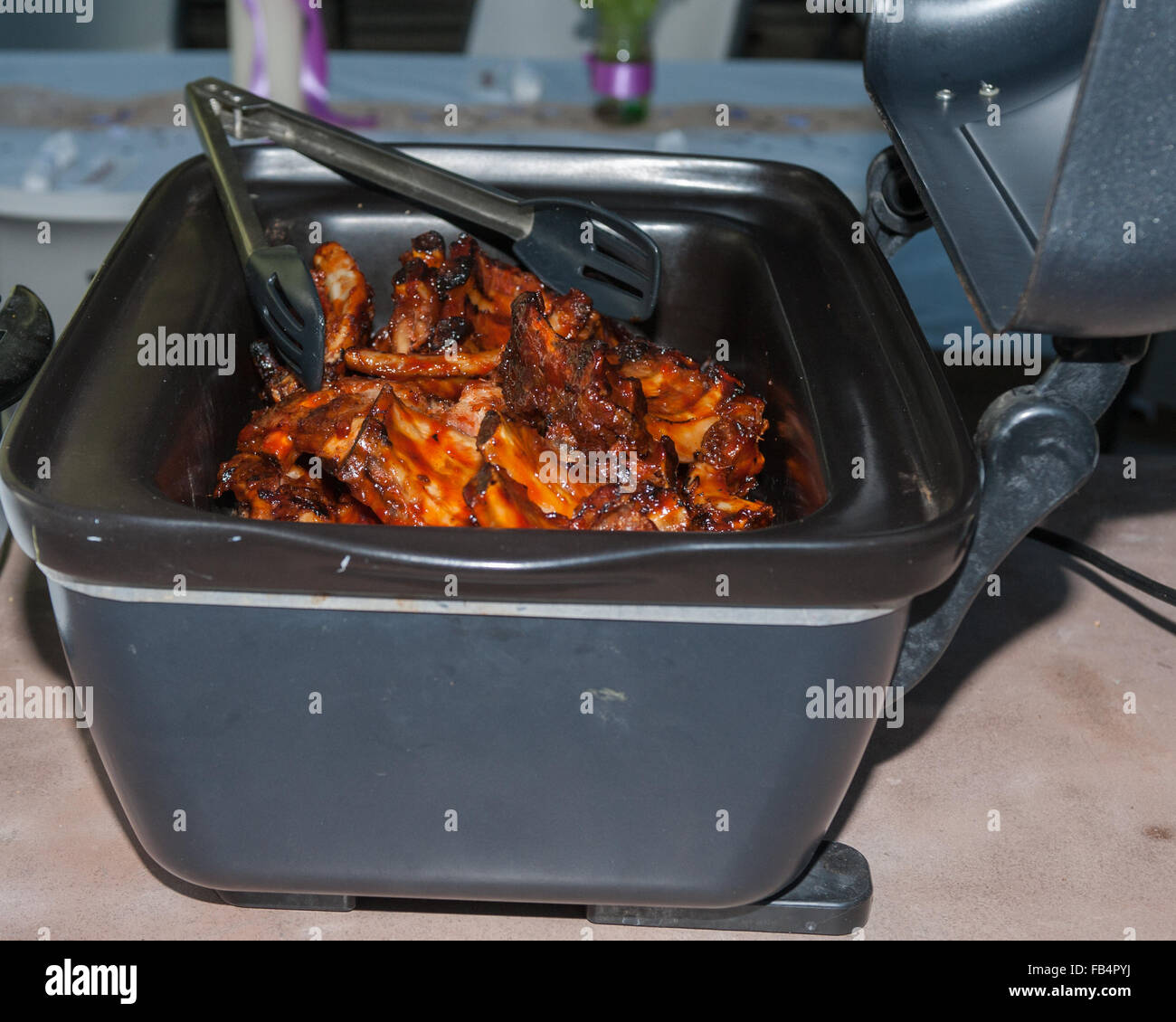 BBQ ribs on the lunch buffet. Stock Photo