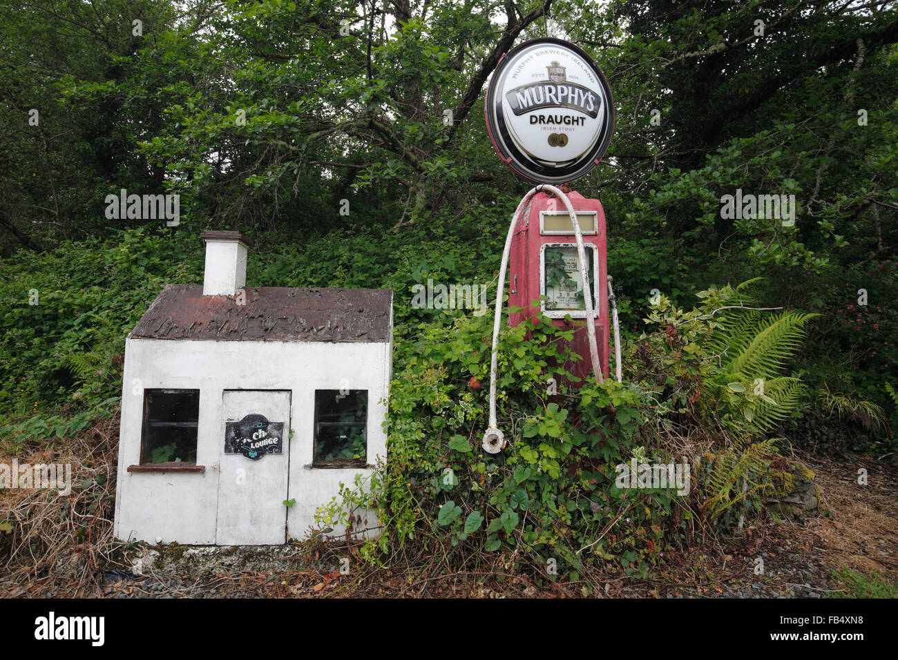 Murphy's Stout logo on an old disused petrol pump near Laragh village on Beara Peninsula, County Kerry, Ireland Stock Photo
