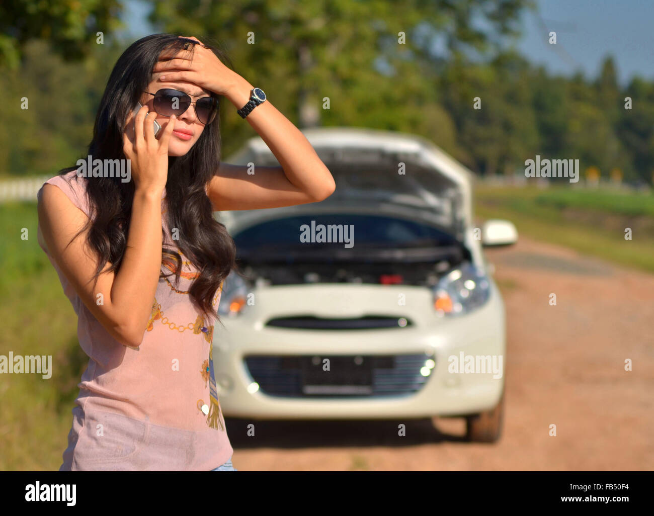 Car Broke Down >> A Woman Calls For Assistance After Her Car Broke Down Stock Photo Car Broke Down >> A Woman Calls For Assistance After Her Car Broke Down Stock Photo
