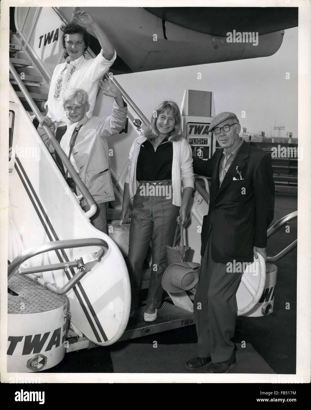 1973 - N.Y. International Airport, August 21:Author Henry Miller, of ''Tropic of Cancer'' and ''Tropic of Capricorn'' fame, and his handsome family, Tony, 11, Val, 14, and wife, prepare to a board a TWA Jetliner to San Francisco. En Route to his famous home, Big Sur. Miler, who is returning home after a four month tour of the continent, told reporters at the airport that the doesn't expect, Nor does he really care, If his controversial votes will ever pass U.S. Postal approval as ''Lady Chatterley's Lover'' did recently. He said, ''My Books were written a quarter of a century ago and I don't Stock Photo