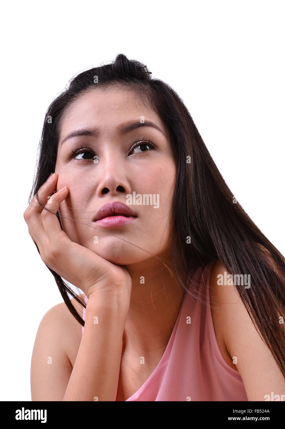 Sad beautiful woman standing against a white background Stock Photo - Alamy