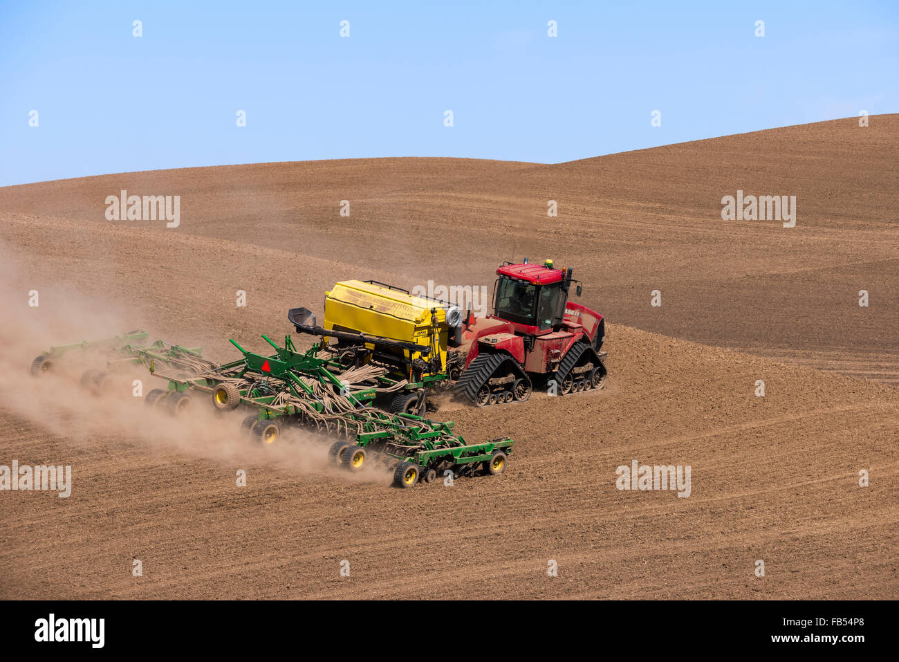 Case quadtrac tractor seeding garbanzo beans in the Palouse region of Eastern Washington Stock