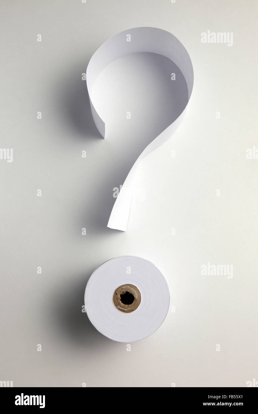 roll of paper and a strip of paper form a question mark Stock Photo Alamy