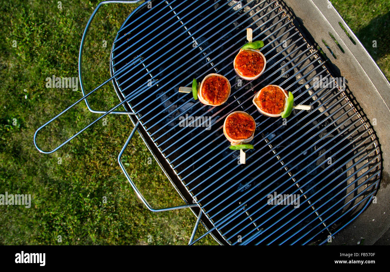 Grilled meat on a summer barbecue in the garden Stock Photo - Alamy
