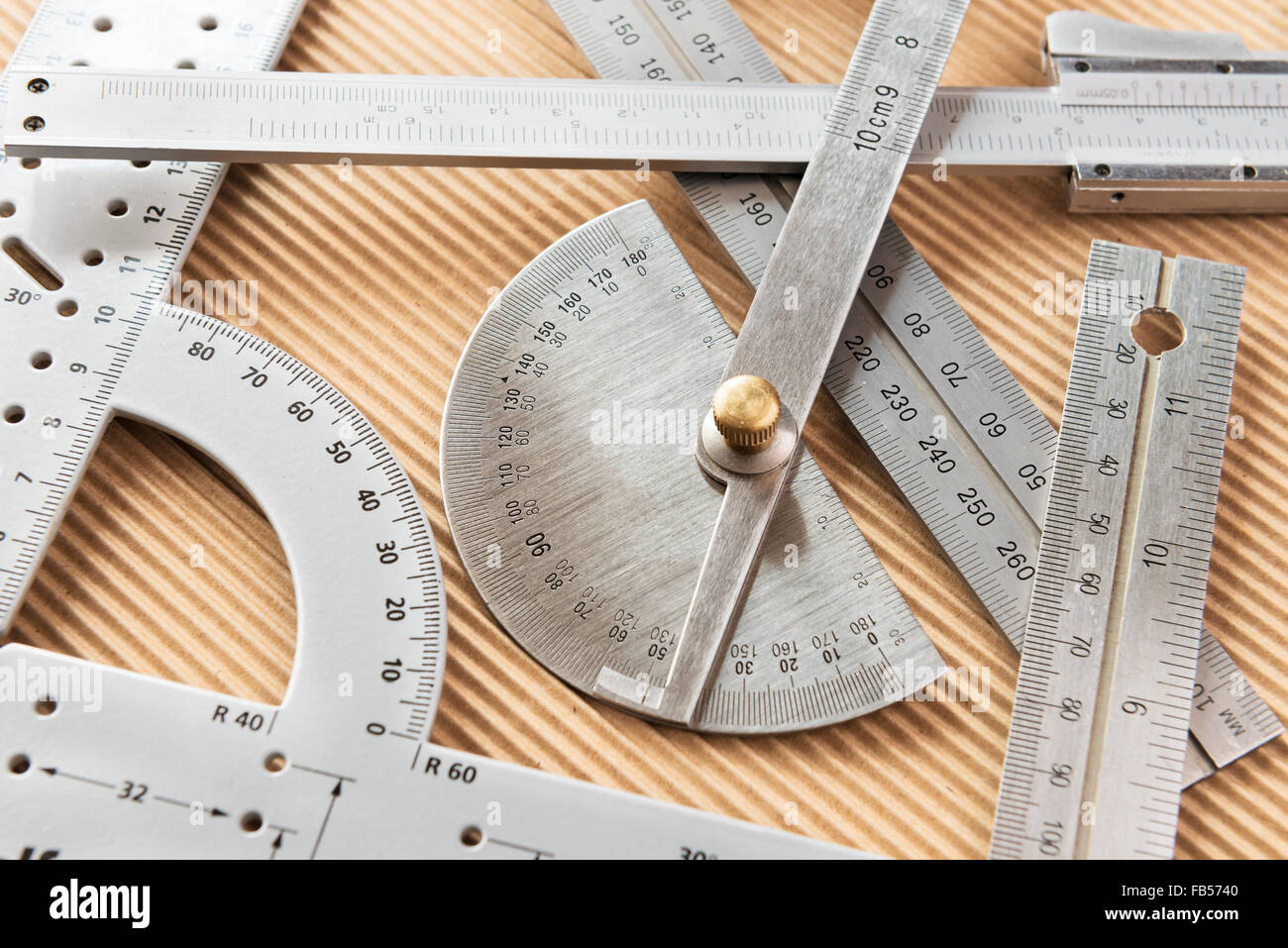 Various randomly arranged metal measuring tools Stock Photo - Alamy