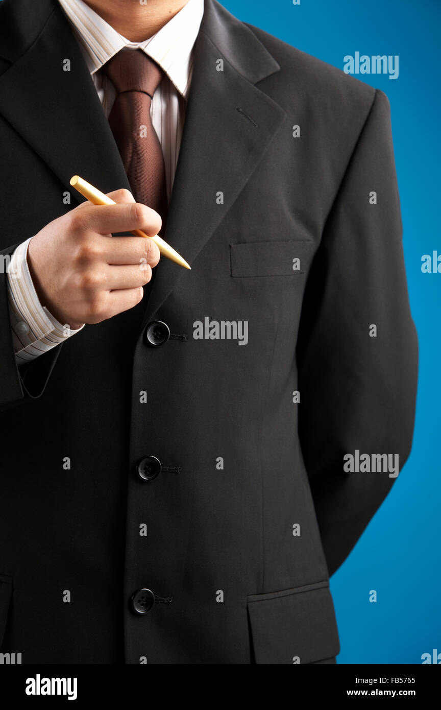 man holding a pen Stock Photo - Alamy