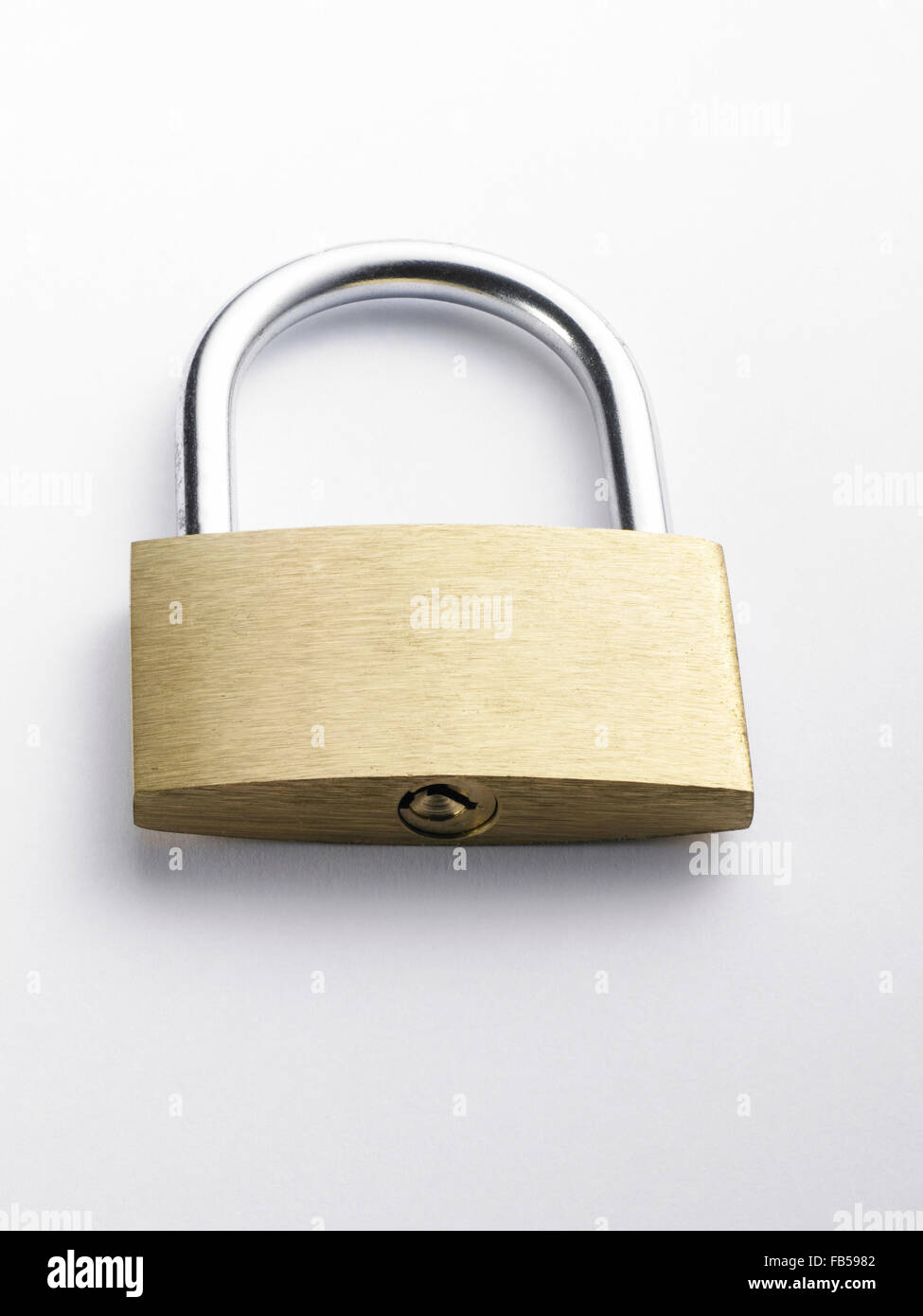 a brass lock on the white background Stock Photo - Alamy