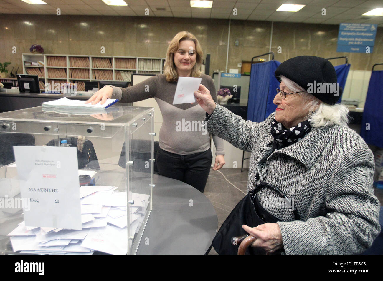 (160110) -- ATHENS, Jan. 10, 2016 (Xinhua) -- A voter casts a ballot inside a polling station at Kifissia suburb, north of Athens, on Sunday, Jan. 10, 2016. Greece's main opposition conservative New Democracy party conducted a nationwide voting to elect a new leader. (Xinhua/Marios Lolos) Stock Photo