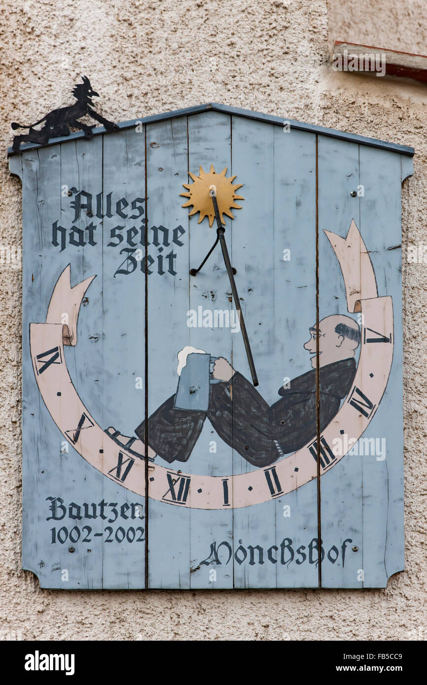 Sundial on a building in Boutzen Germany Stock Photo