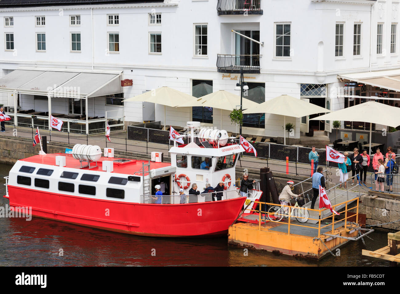 Passengers disembarking from city ferry on River Glomma in Fredrikstad, Ostfold, Norway, Scandinavia, Europe Stock Photo