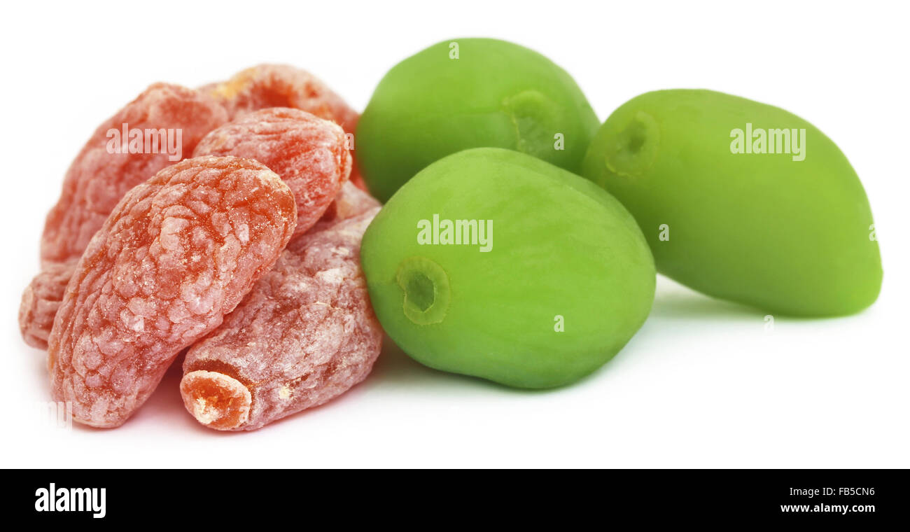 Dried and green peach over white background Stock Photo Alamy