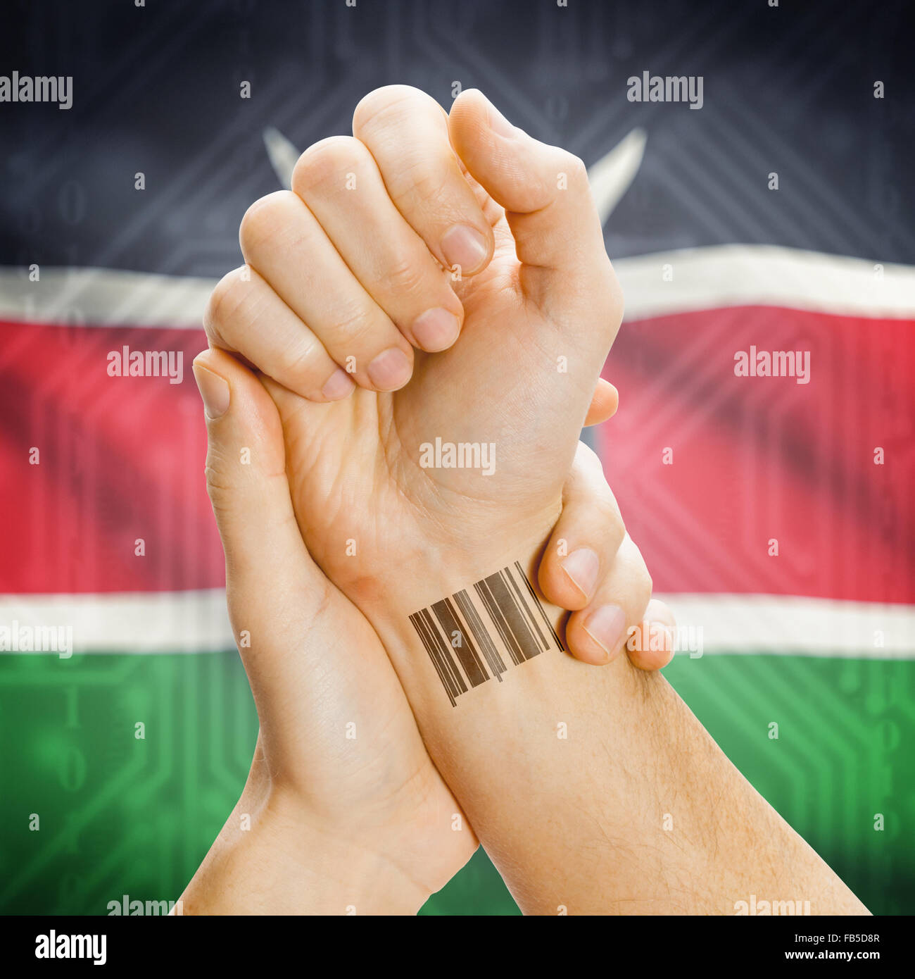 Barcode ID number on wrist of a human and national flag on background series - Kenya Stock Photo