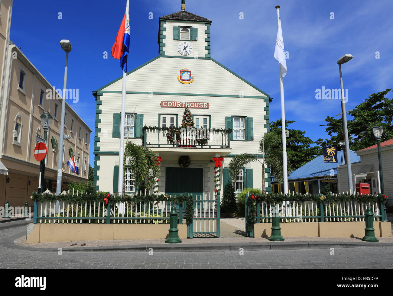 The Court House in the capital, Philipsburg, takes centre stage as passengers disembark from the numerous cruise ships visiting Sint Maarten. Stock Photo