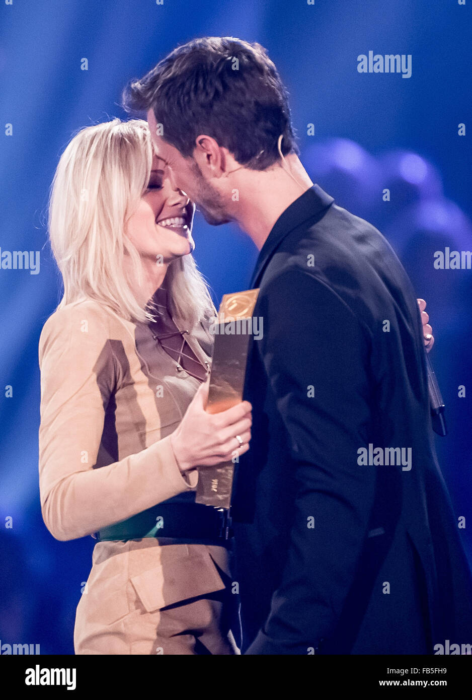 Berlin, Germany. 09th Jan, 2016. Singer Helene Fischer (L) kisses her  partner and host of the show, Florian Silbereisen, during the live  television show 'Das grosse Fest der Besten' (lit. The big