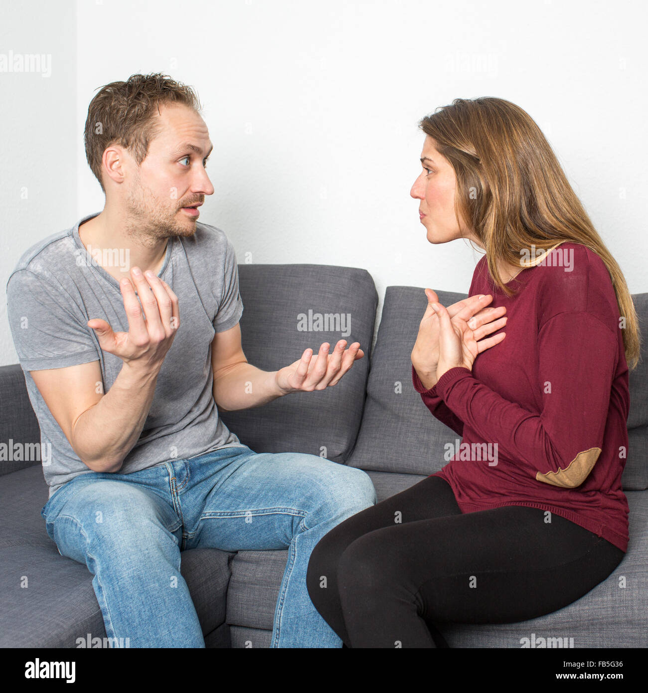 Couple having an argument Stock Photo - Alamy