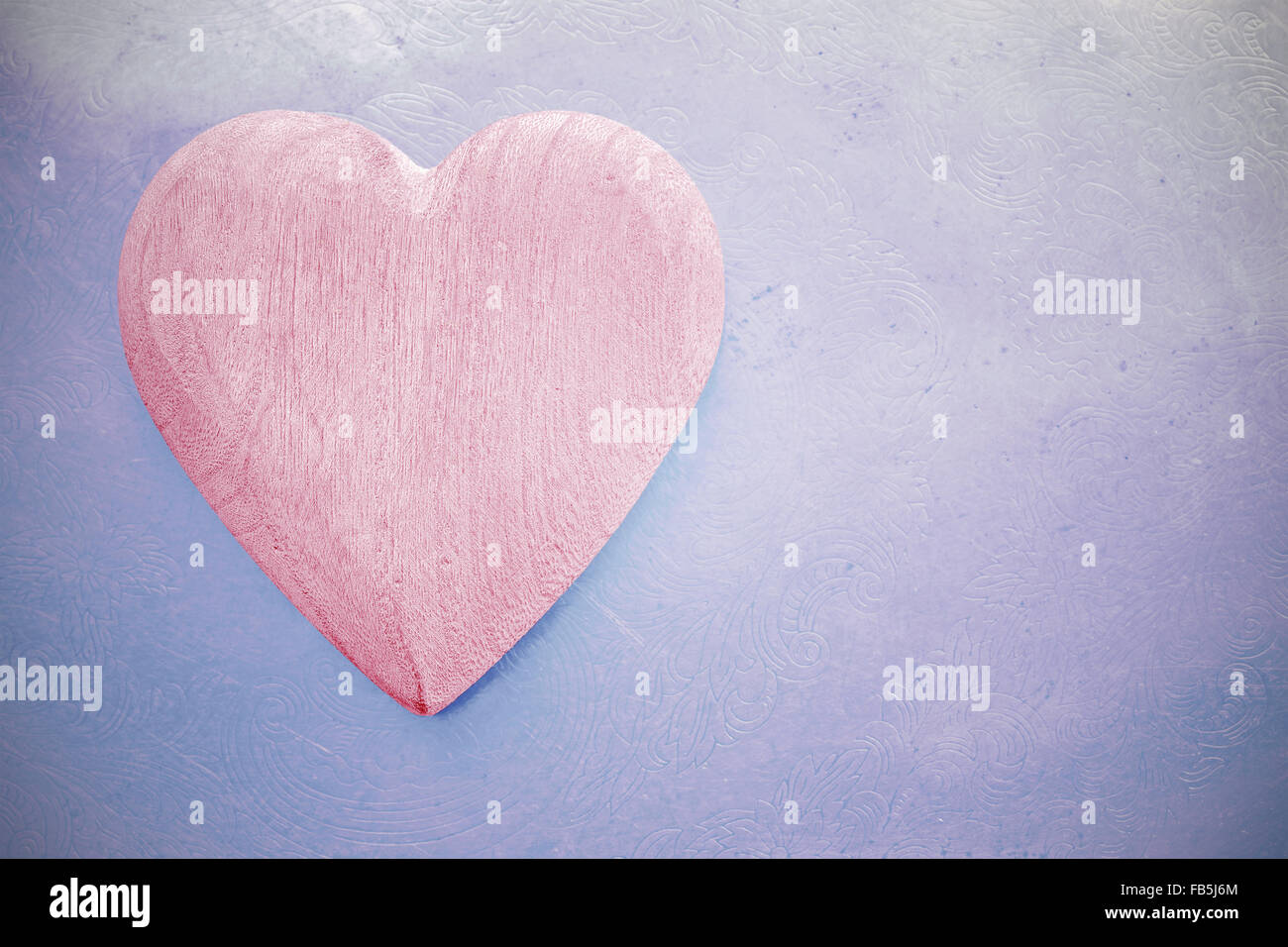 Vintage toned wooden heart on grunge background, space for text Stock ...