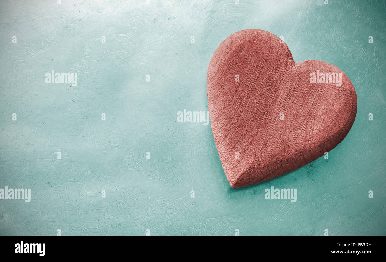 Vintage toned wooden heart on grunge background, space for text Stock ...