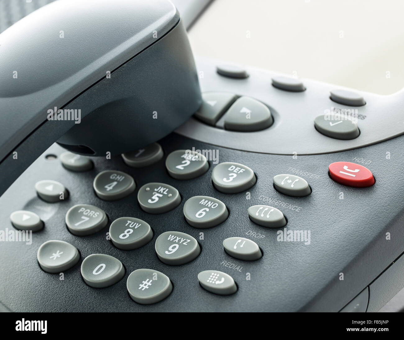 Gray Office Telephone with keypad close up Stock Photo