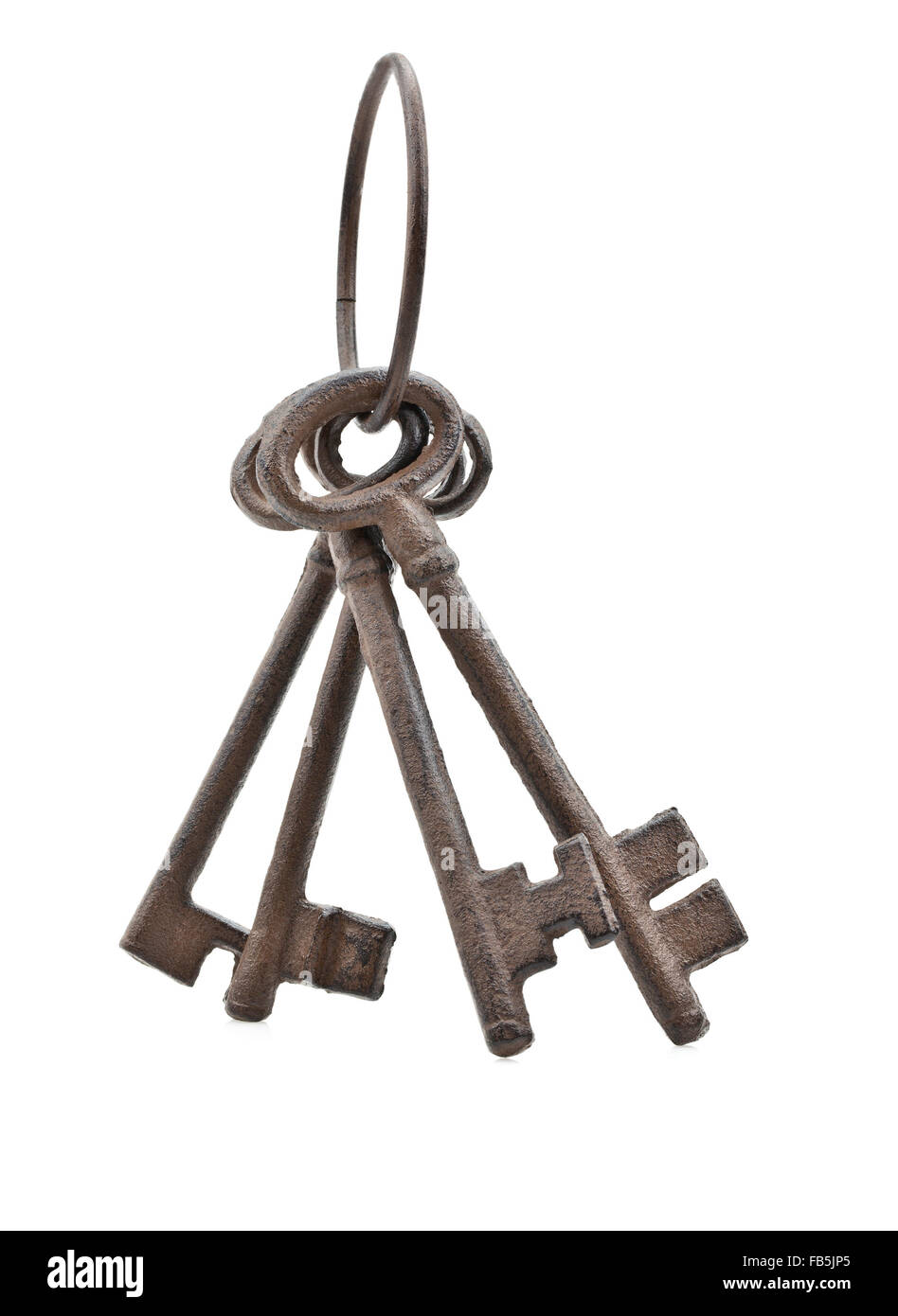 Set of old rusty antique keys over white background Stock Photo