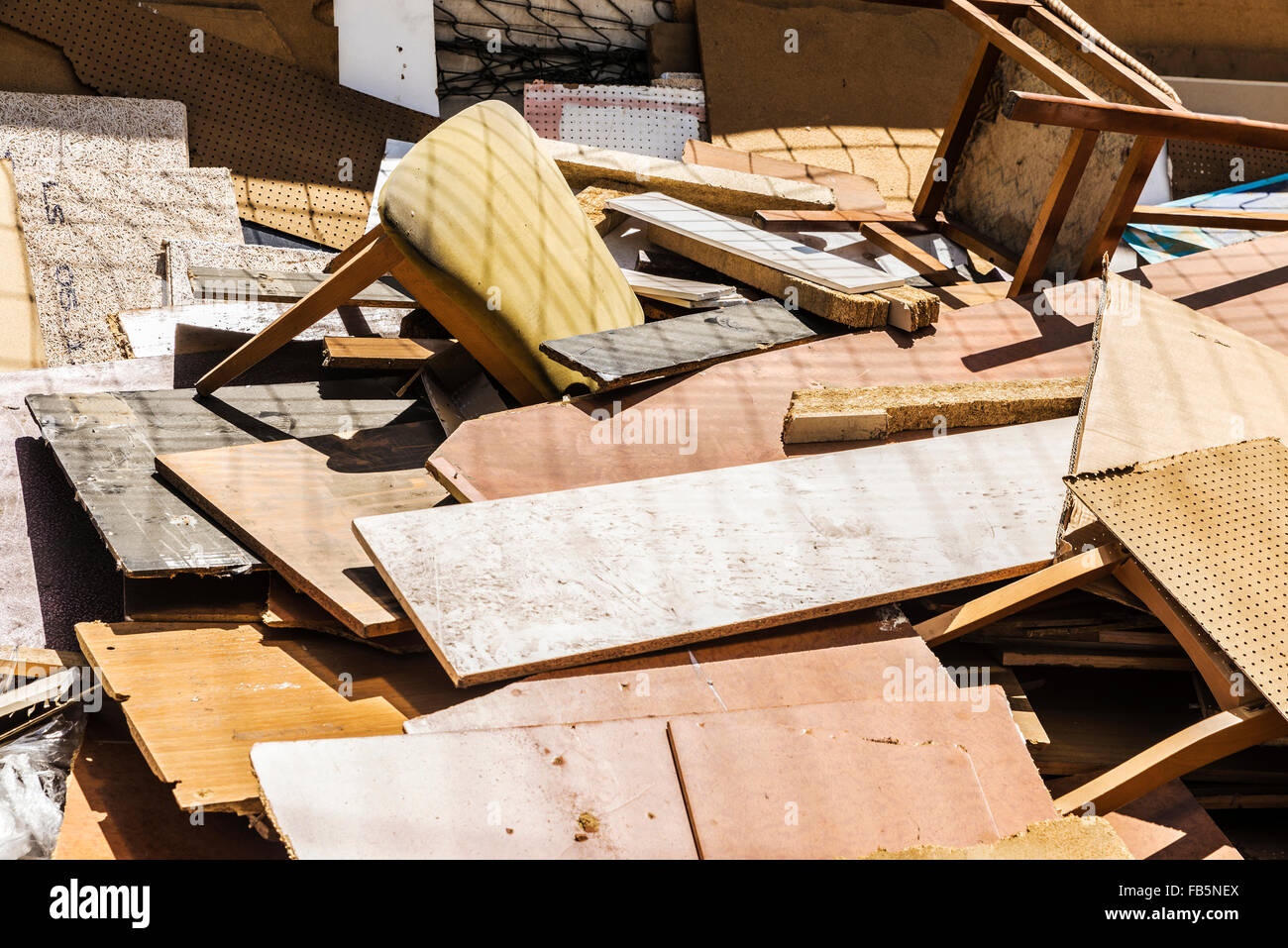 Lots of old wood, chairs, planks and rubble Stock Photo