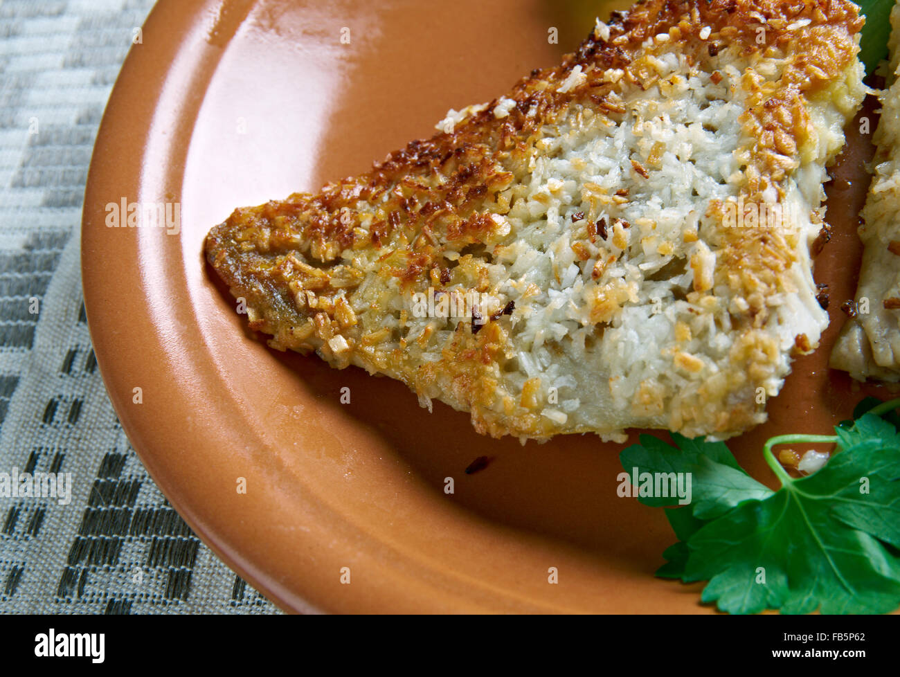 Coconut Crusted Fish fried fish in coconut flakes. the island of