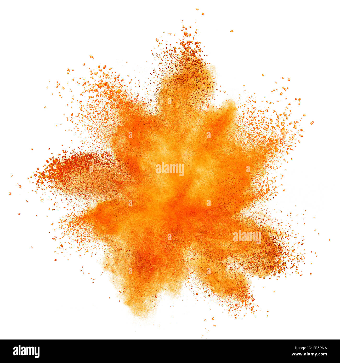 orange powder explosion isolated on white background Stock Photo