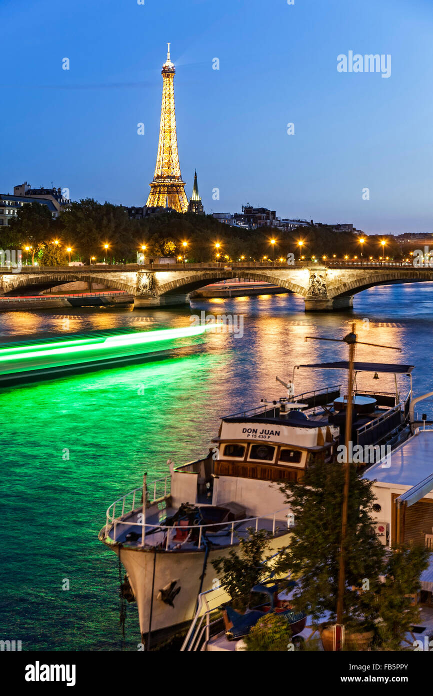 Eiffel Tower and boat light streaks on River Seine, Paris, France Stock Photo