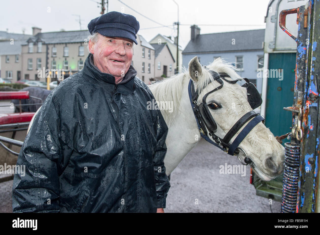 Drimoleague, Ireland. 10th January, 2016. John O'Mahony from Church Cross is pictured with his horse, Misty after the Drimoleague to Drinagh Cheval. The Cheval was held to raise funds for COPE Foundation. Credit: Andy Gibson/Alamy Live News Stock Photo