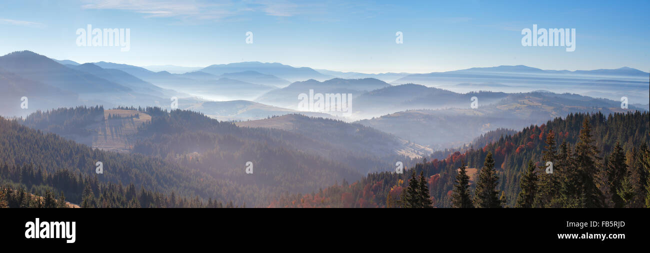 Morning mist in mountains. Sunrise and autumn mist over the hills. Ukraine Carpathians Stock Photo