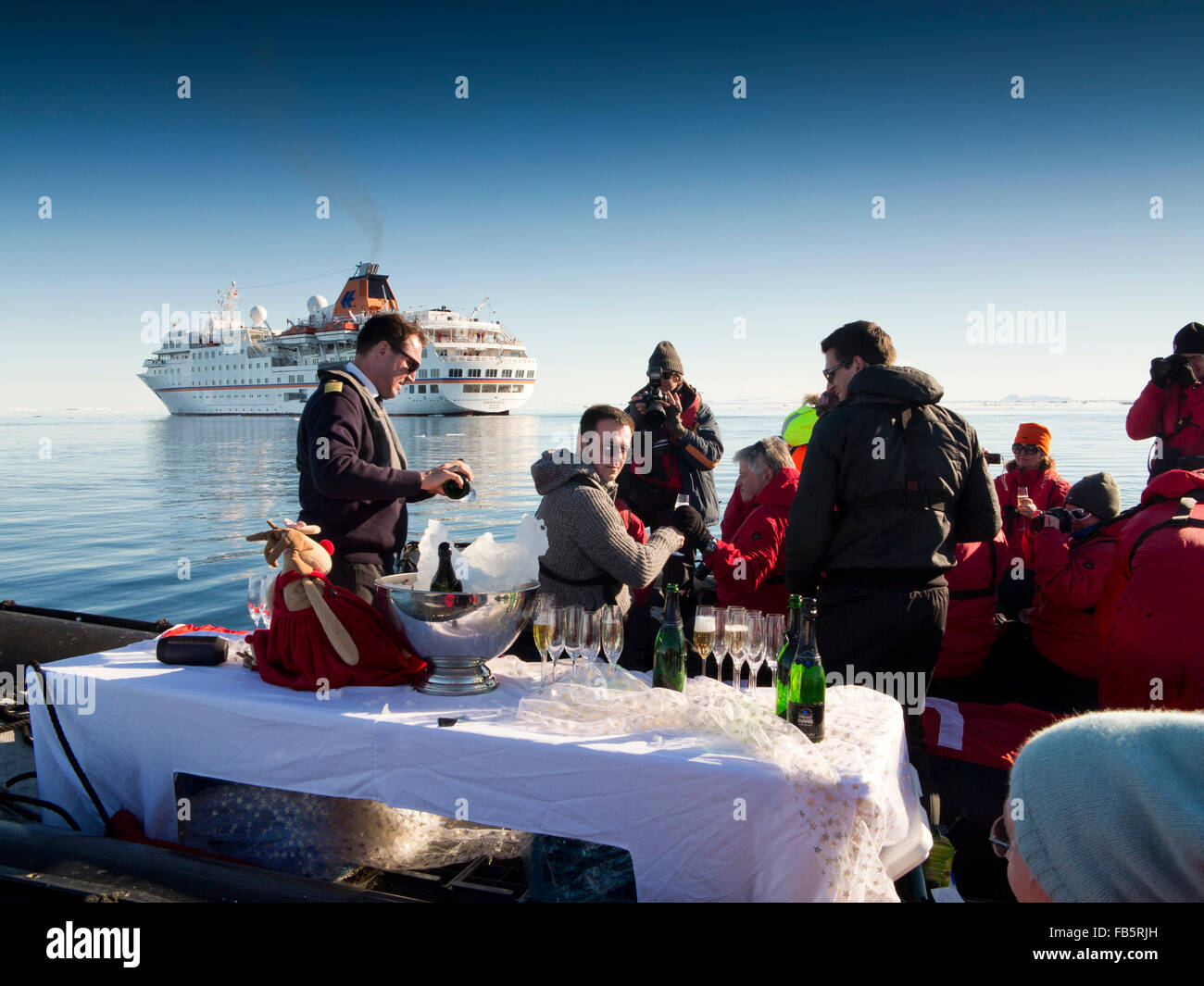 Antarctica, Weddell Sea, Antarctic cruising, MS Hanseatic zodiac mobile bar serving champagne Stock Photo