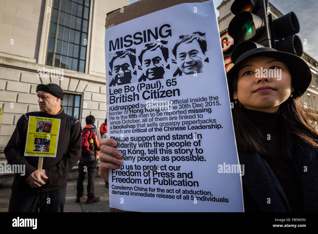 London, UK. 10th January, 2016. Protesters outside the London Chinese Embassy urging Hong Kongers to condemn China government of cross border abduction and disappearance of co-owners and employees of a bookshop in Hong Kong which sold politically sensitive books critical of Chinese Communist Party leader Credit:  Guy Corbishley/Alamy Live News Stock Photo