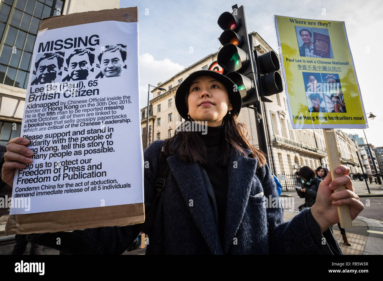 London, UK. 10th January, 2016. Protesters outside the London Chinese Embassy urging Hong Kongers to condemn China government of cross border abduction and disappearance of co-owners and employees of a bookshop in Hong Kong which sold politically sensitive books critical of Chinese Communist Party leader Credit:  Guy Corbishley/Alamy Live News Stock Photo