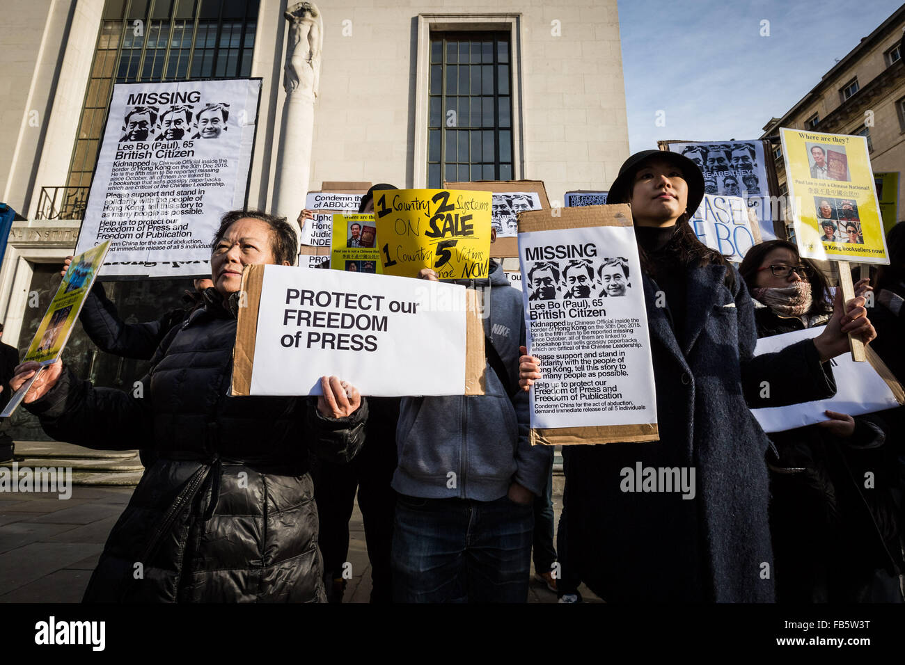 London, UK. 10th January, 2016. Protesters outside the London Chinese Embassy urging Hong Kongers to condemn China government of cross border abduction and disappearance of co-owners and employees of a bookshop in Hong Kong which sold politically sensitive books critical of Chinese Communist Party leader Credit:  Guy Corbishley/Alamy Live News Stock Photo