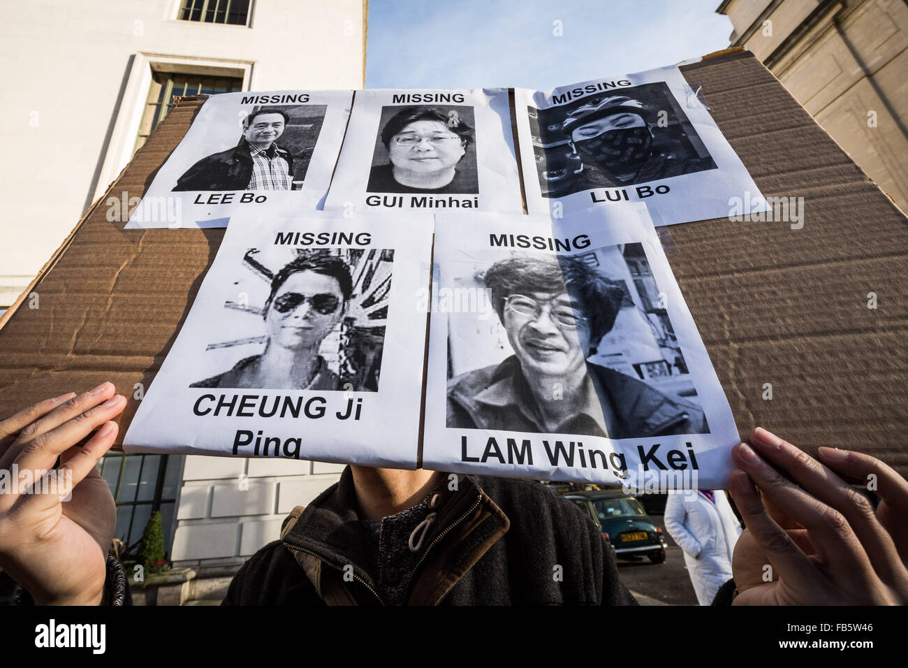 London, UK. 10th January, 2016. Protesters outside the London Chinese Embassy urging Hong Kongers to condemn China government of cross border abduction and disappearance of co-owners and employees of a bookshop in Hong Kong which sold politically sensitive books critical of Chinese Communist Party leader Credit:  Guy Corbishley/Alamy Live News Stock Photo