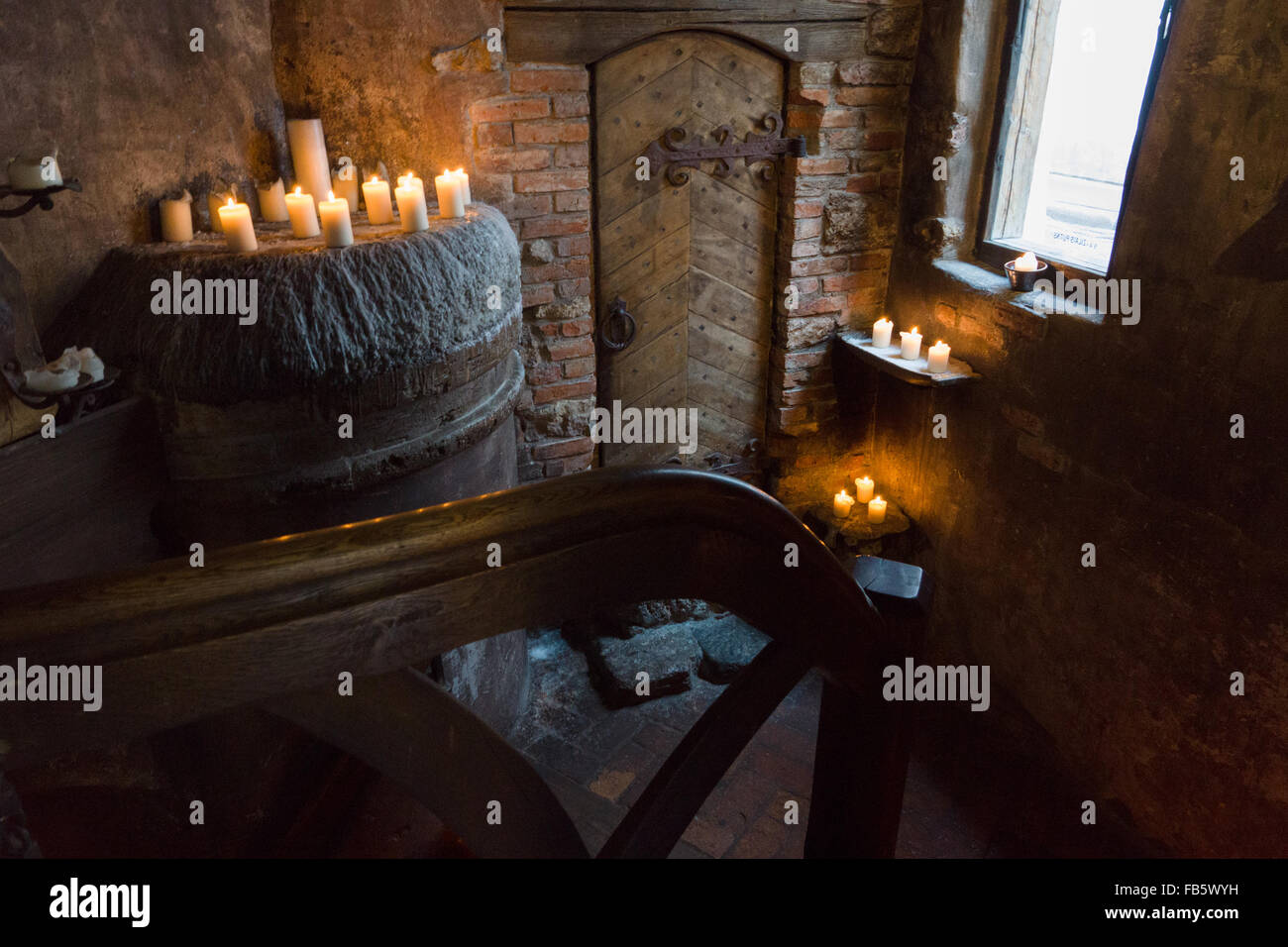 the cellar with the burning candle is located in an ancient tavern