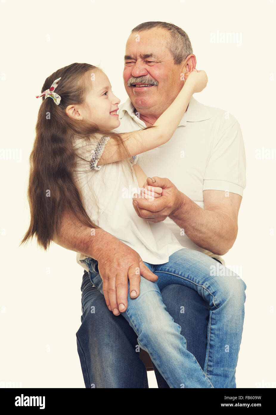 Grandfather and grandchildren portrait studio shoot Stock Photo