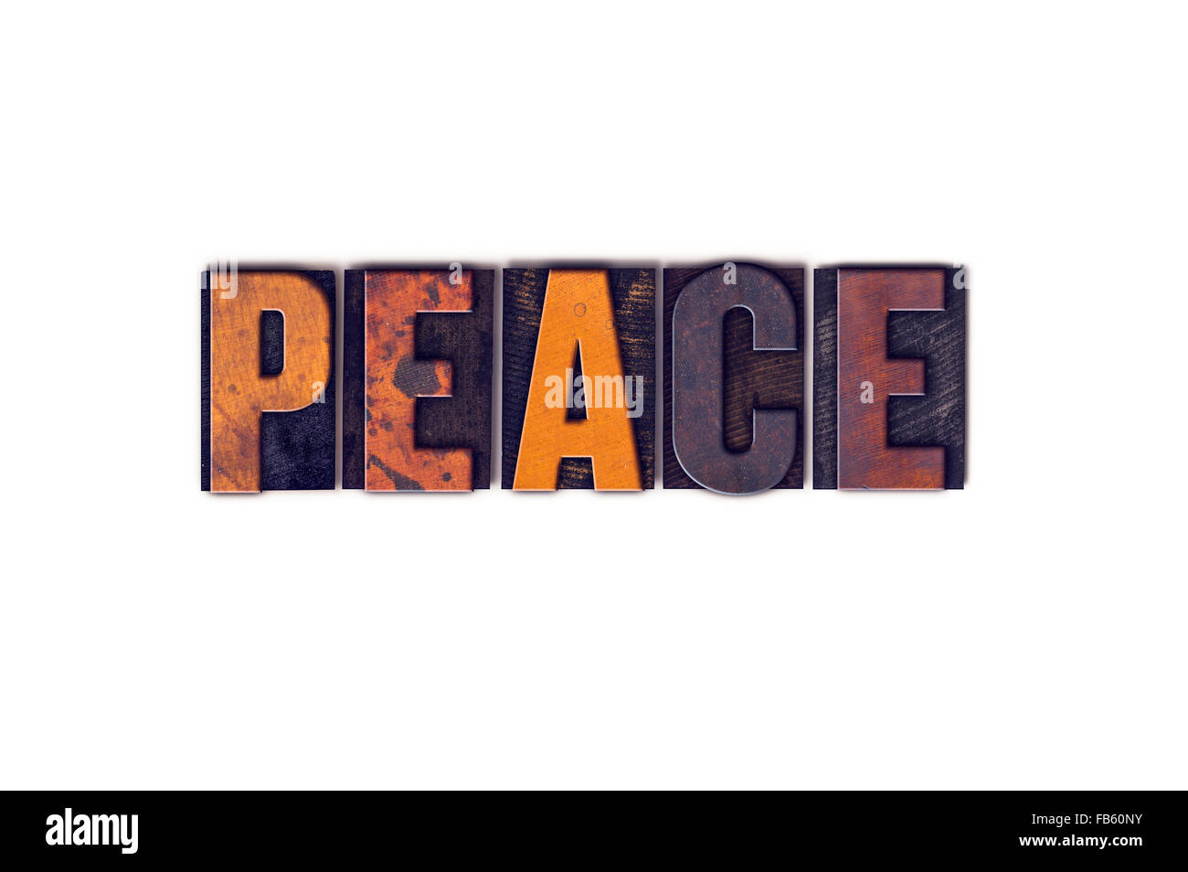 The word 'Peace' written in isolated vintage wooden letterpress type on a white background. Stock Photo