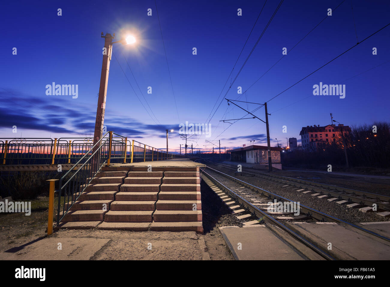 Railway station at night. Railroad in Ukraine. Stock Photo