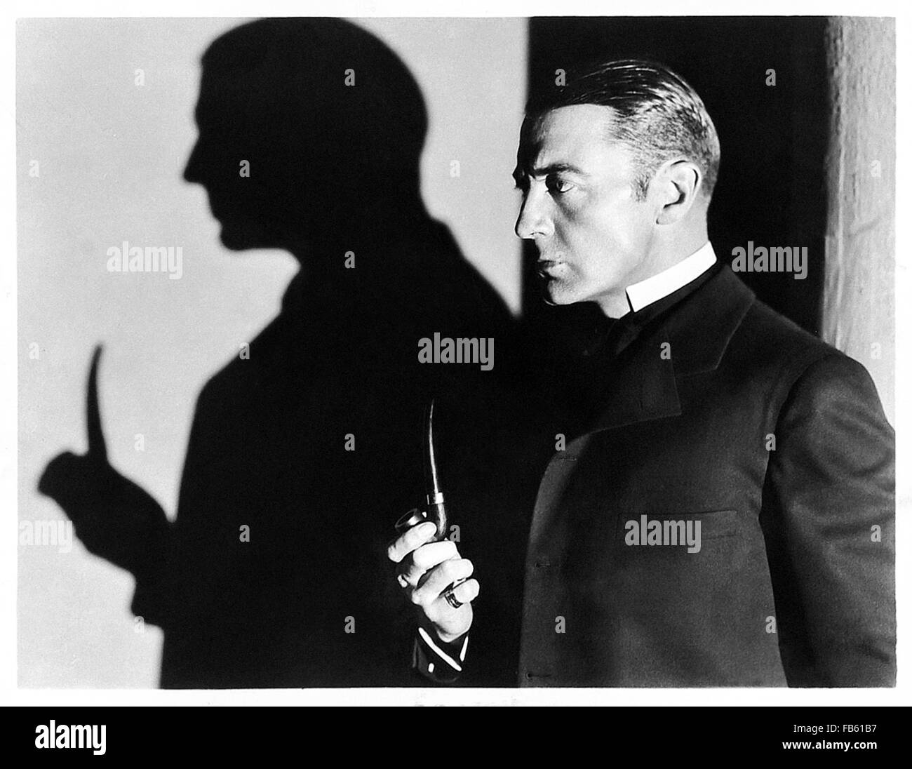 Publicity photograph showing Clive Brook in the role of Sherlock Holmes released to promote 'The Return of Sherlock Holmes' 1929 film directed by Basil Dean. See description for more information. Stock Photo