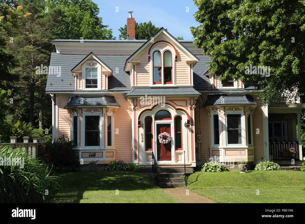A wooden house in Mahone Bay in Nova Scotia, Canada. The building has a